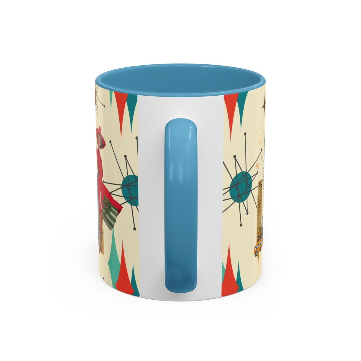 Mid Century Modern coffee mug featuring kitschy Christmas design with vintage cityscape and starburst patterns.