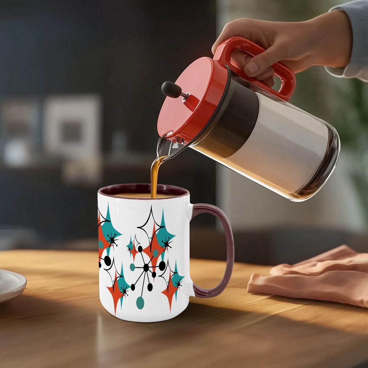 Large 15oz mug featuring a colorful mid-century modern atomic starburst design in teal, orange, and black.