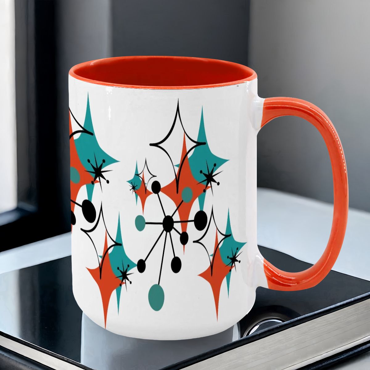 Large 15oz mug featuring a colorful Mid Century Modern atomic starburst design in teal, orange, and black.