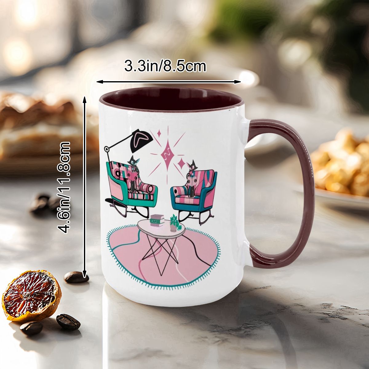 Colorful 15oz mug featuring atomic reading cats, mid-century modern chairs, and a stylish coffee table design.