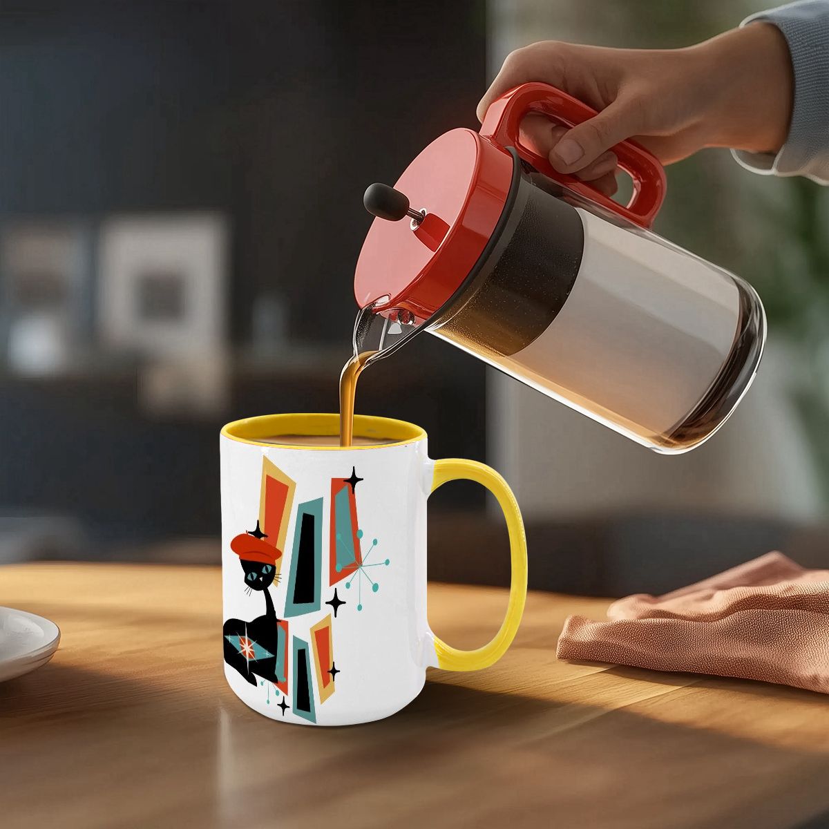 Mid Century Modern coffee mug featuring an atomic cat design with geometric shapes in vibrant colors.
