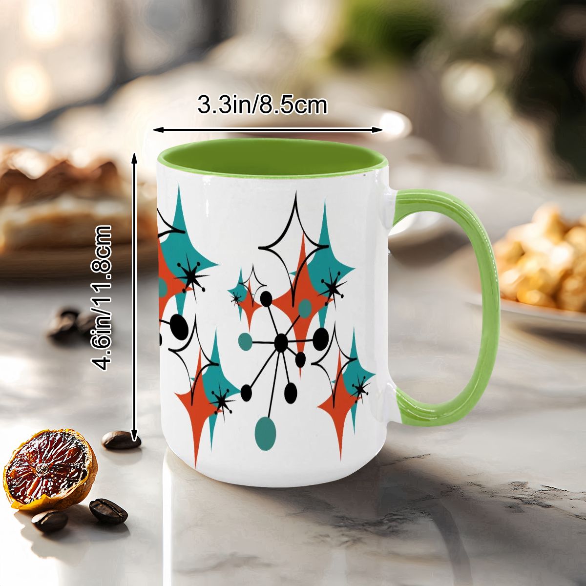 Large 15oz mug featuring a colorful Mid Century Modern atomic starburst design with a green handle and interior.