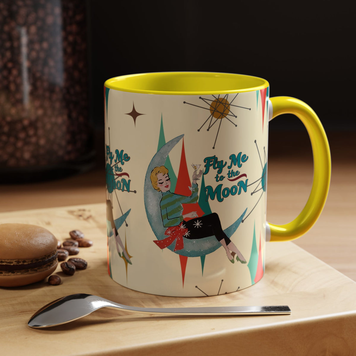 Mid Century Modern retro Christmas mug featuring a vintage illustration of a woman on a moon with 'Fly Me to the Moon' text.