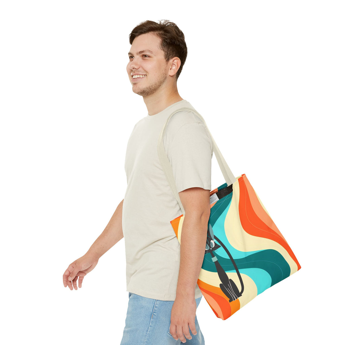 Mid-century modern tote bag featuring a colorful atomic cat design with groovy waves in teal, orange, and cream.
