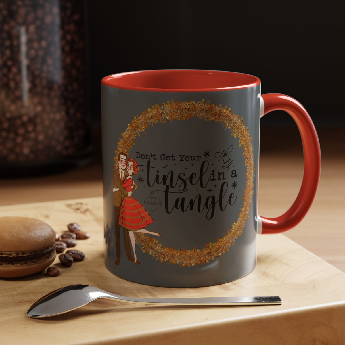 Vintage 50s kitschy Christmas mug featuring a playful design with the phrase "Don't Get Your Tinsel In A Tangle" and festive characters.