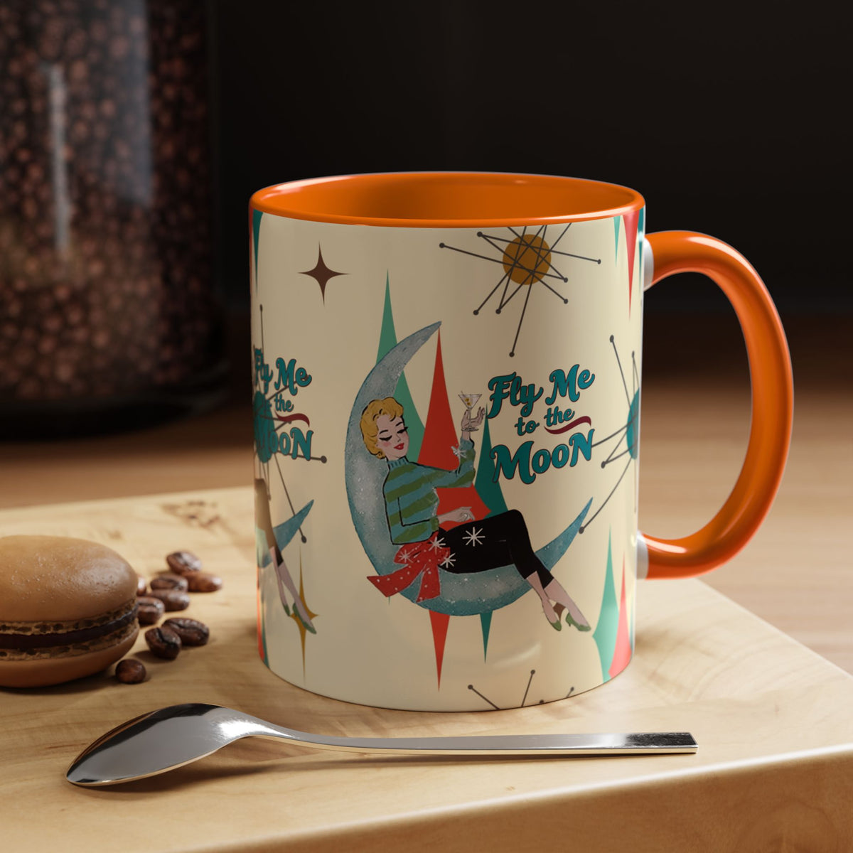 Mid Century Modern retro Christmas mug featuring 'Fly Me to the Moon' design with vintage-inspired graphics and vibrant colors.