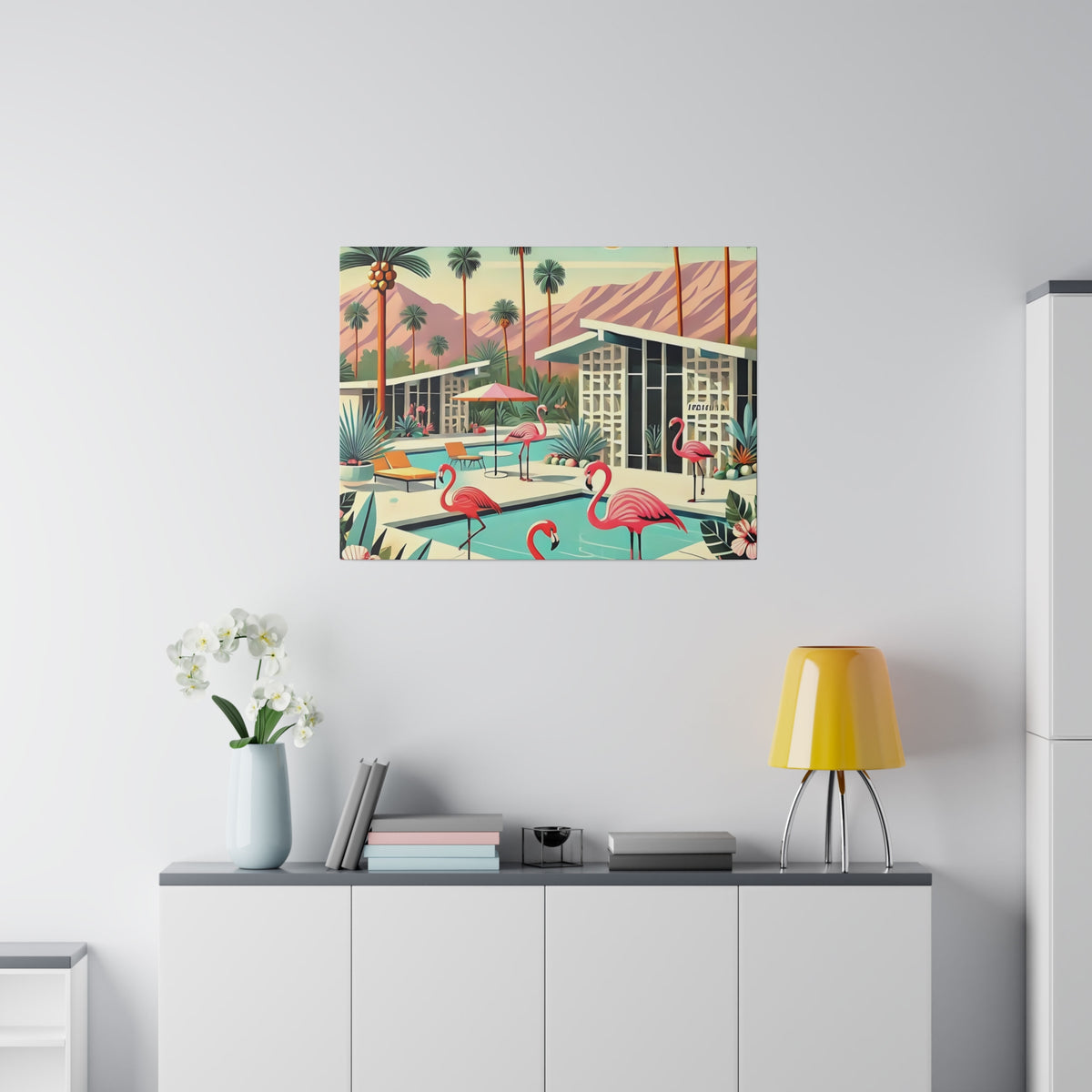 Mid-century modern wall art featuring flamingos and a Palm Springs pool scene, ideal for retro-inspired decor.