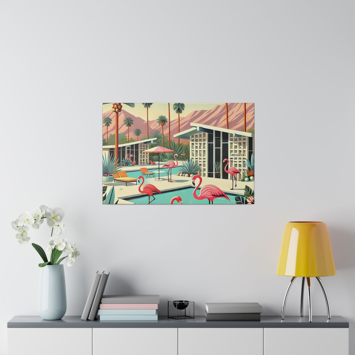 Mid-century modern wall art featuring a Palm Springs scene with flamingos, a pool, and iconic architecture in vibrant colors.