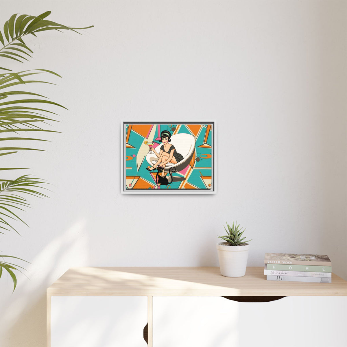 Framed matte canvas wall art featuring a vintage cocktail and retro cat design in vibrant colors, perfect for mid-century decor.