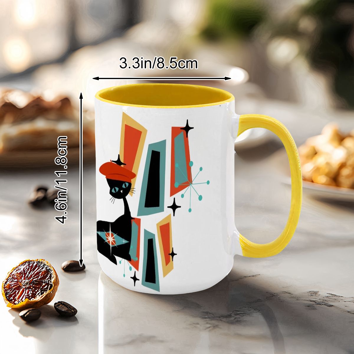 Mid Century Modern coffee mug featuring an atomic cat and geometric design in vibrant colors, perfect for retro decor lovers.