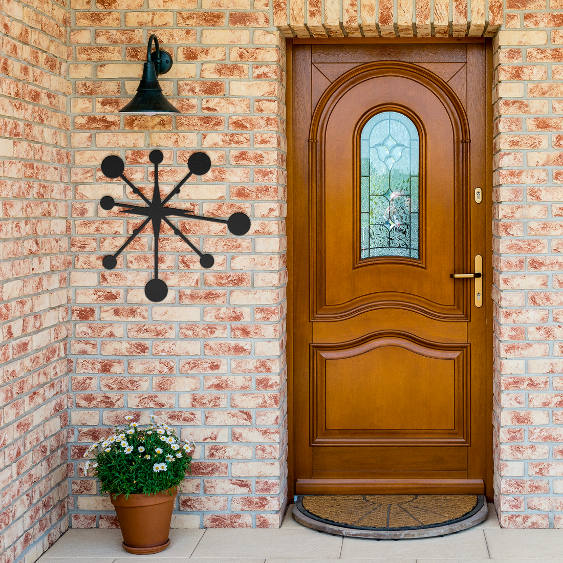 Atomic_Starburst_Mid_Century_Modern_Met_Black_Brick_Entrance_Mockup.png