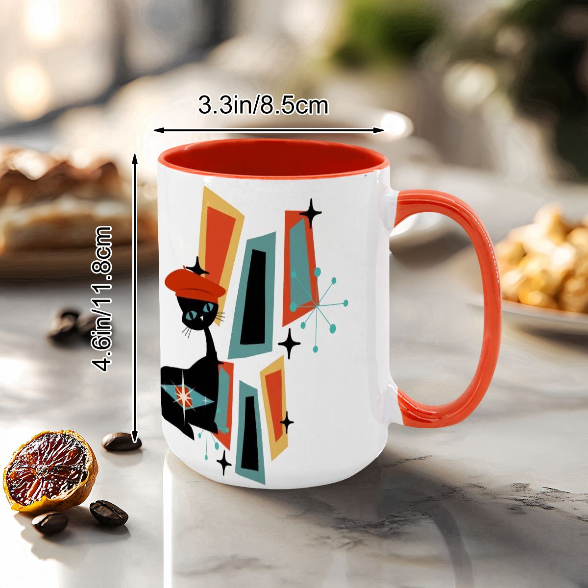 Mid Century Modern coffee mug featuring an atomic cat design with geometric shapes in vibrant colors.